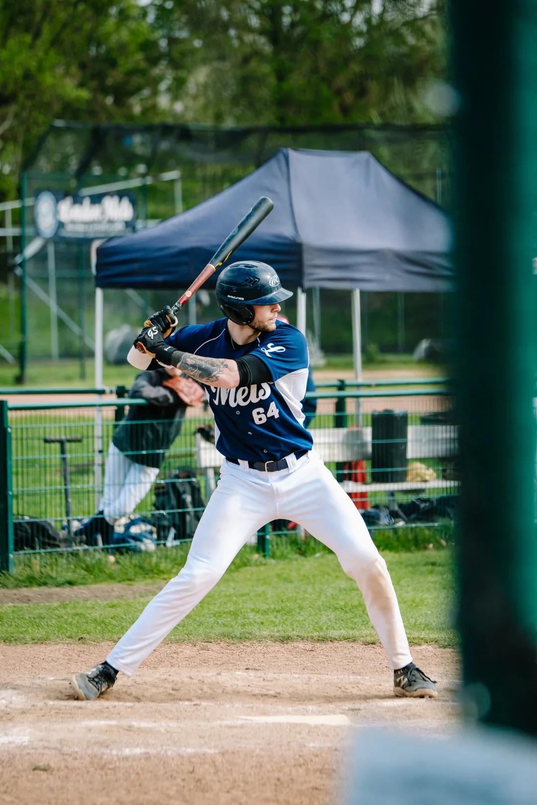 Conner Brown, number 64, in his batting stance for the London Mets